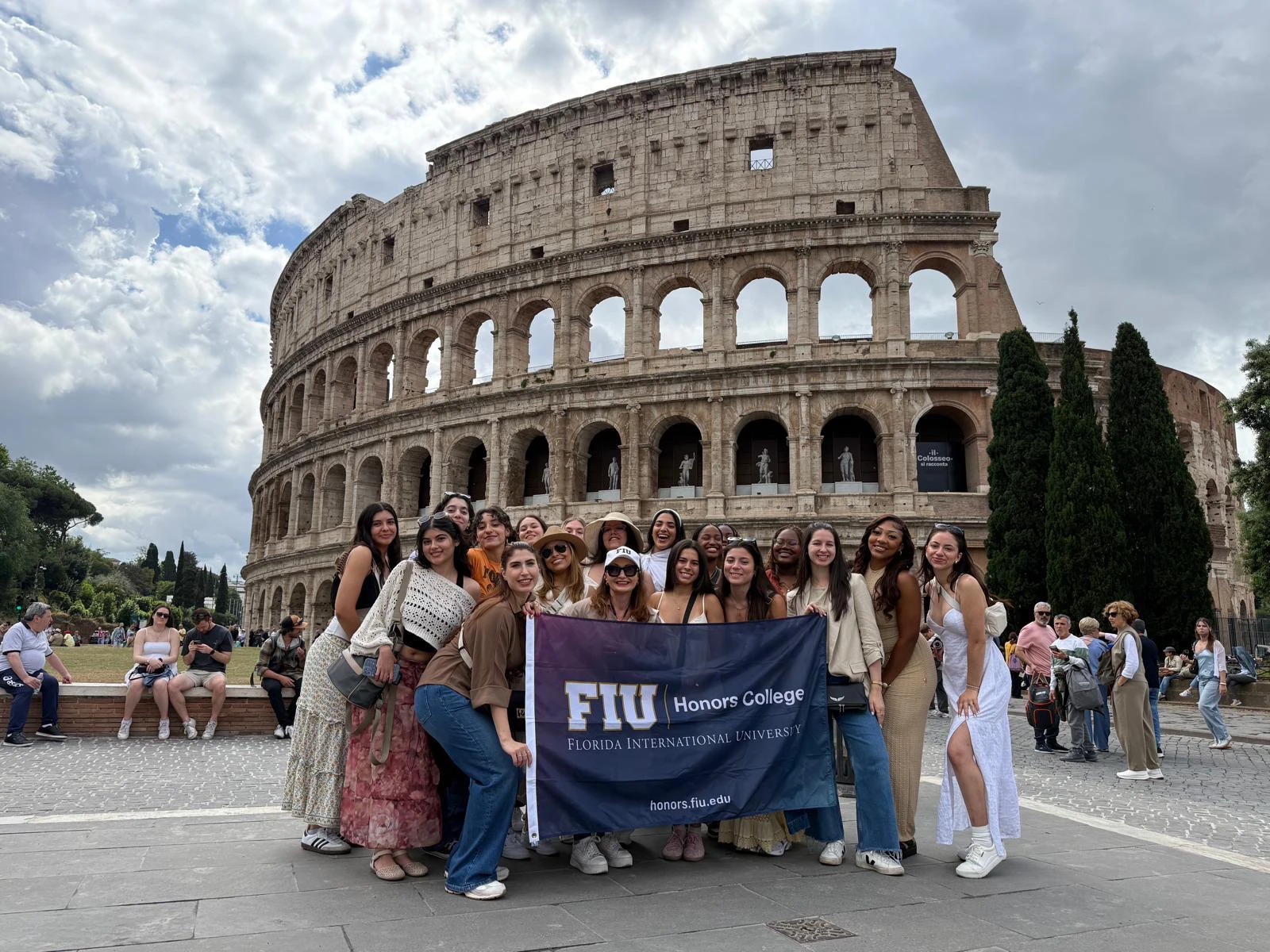 Honors Study Abroad students in front of the Coliseum