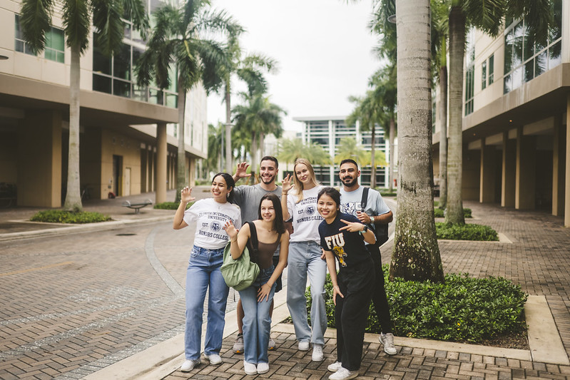 FIU Honor's students standing inbetween the Parkview student housing complex