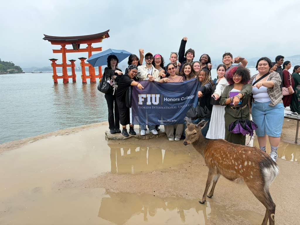 FIU Study Abroad Honors students in Miyajima Island with deer