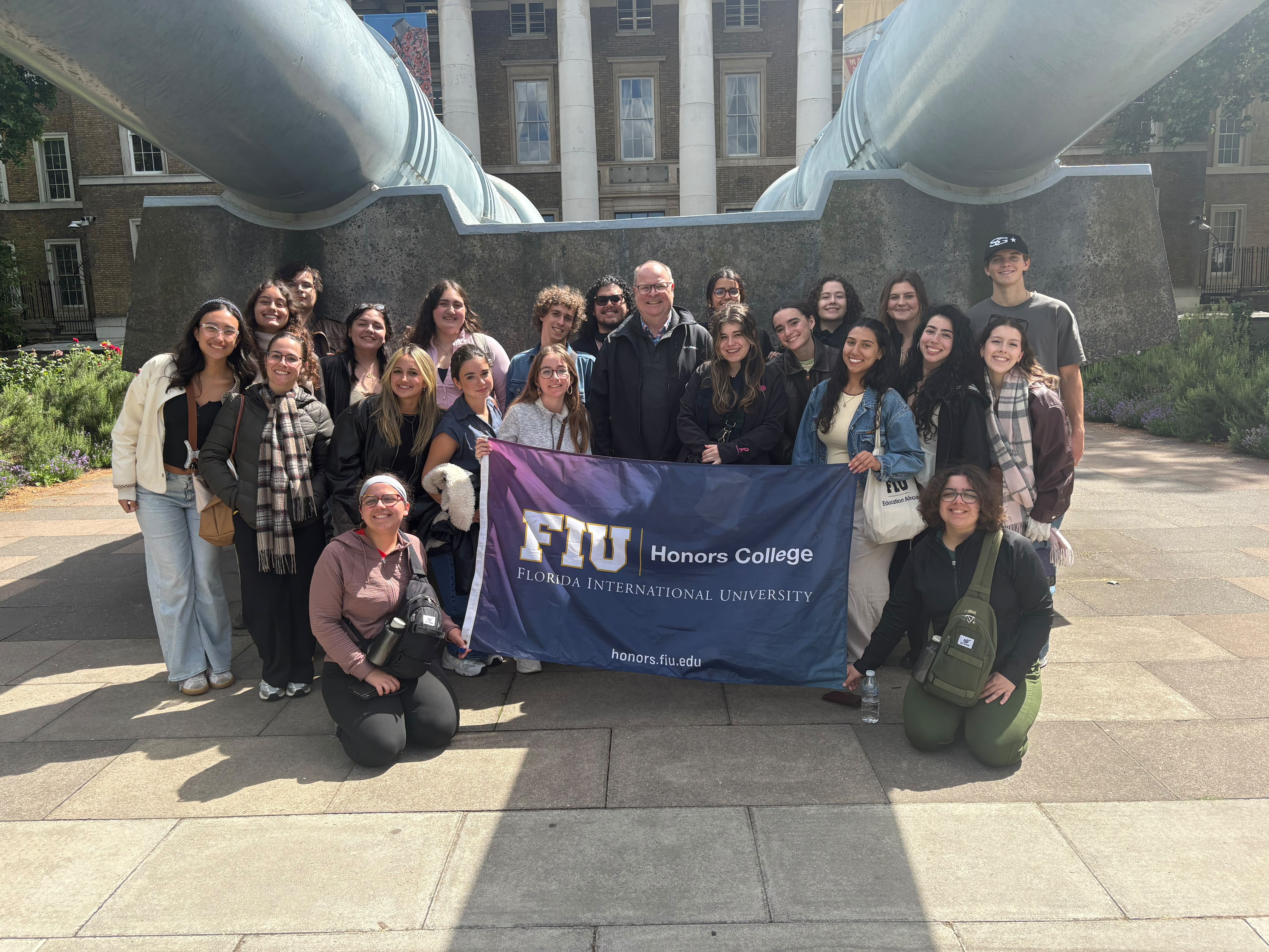 FIU Honors students in a sheep meadow